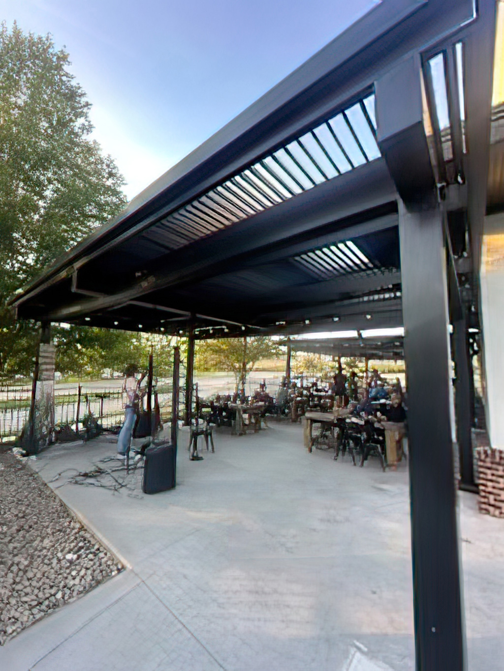 Attached operable pergola in black