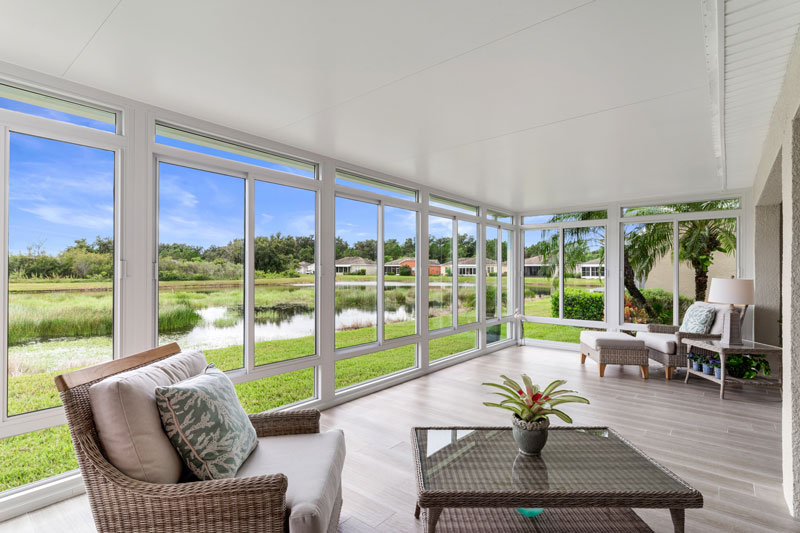 Lanai Porch Makeover with Sunroom, Studio Roof, Vistaview Walls, Upper Transoms, Lower Transoms, White